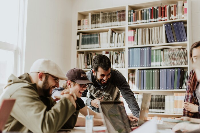 image of individuals working together.