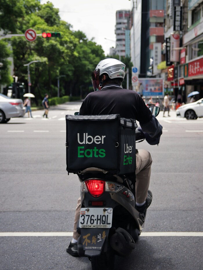 Image of an individuals delivery food with Uber Eats.